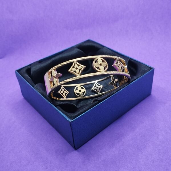 Star and Clover broad bangle bracelet